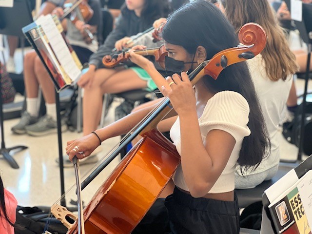 Student playing music